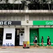 Singapore đưa ra biện pháp hạn chế tạm thời thương vụ Grab-Uber